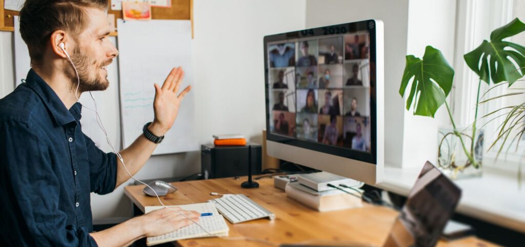 Remote team members connecting virtually with brand values in focus