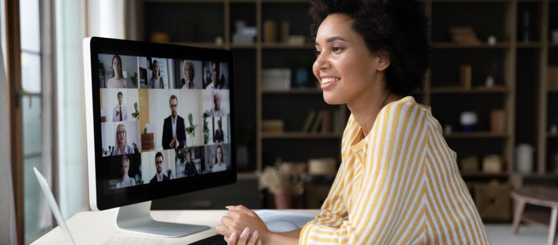 Professional woman leading virtual team meeting demonstrating accountability and responsibility in remote team management