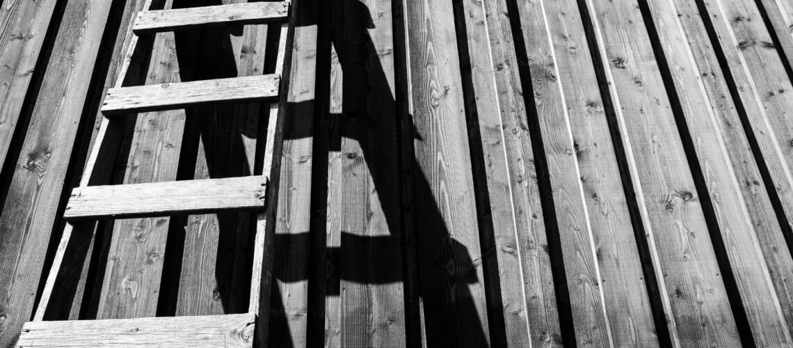 Wooden ladder representing progression through accountability levels
