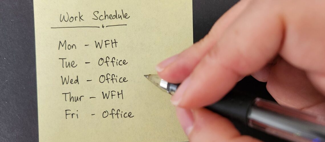 Hand-written work schedule showing hybrid working pattern with WFH and office days planned throughout the week