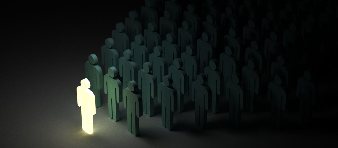 Glowing leader figure emerging from crowd symbolising assertive leadership influence and authentic presence